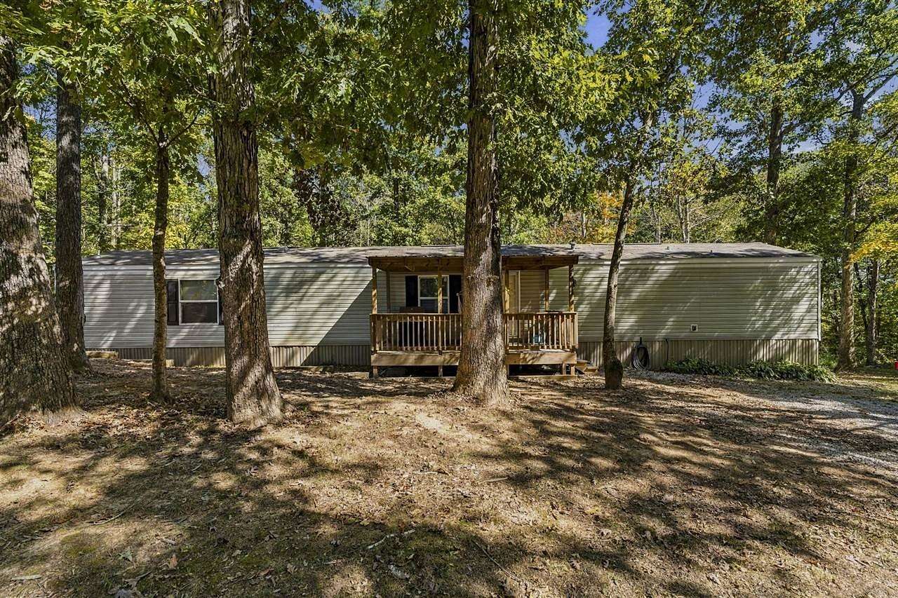 7 Acres of Land with Home for Sale in Roundhill, Kentucky