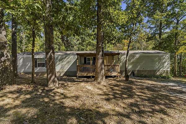 7 Acres of Land with Home for Sale in Roundhill, Kentucky
