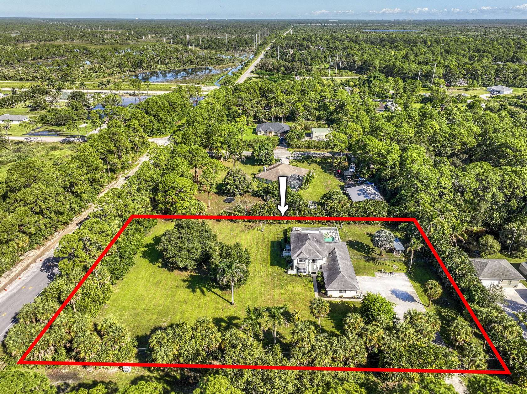 2 Acres of Land with Home for Sale in The Acreage, Florida