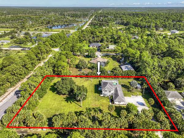 2 Acres of Land with Home for Sale in The Acreage, Florida