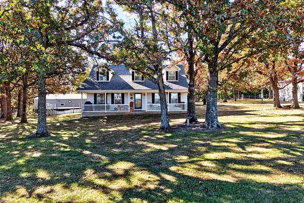 10.8 Acres of Land with Home for Sale in Strafford, Missouri