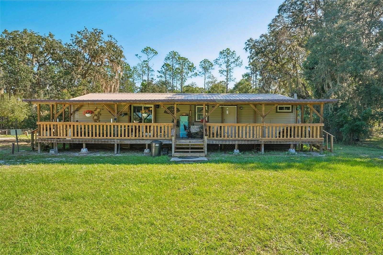 1.59 Acres of Land with Home for Sale in Interlachen, Florida