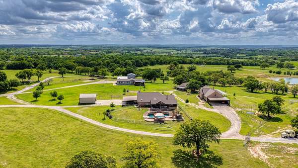165 Acres of Land with Home for Sale in Boyd, Texas