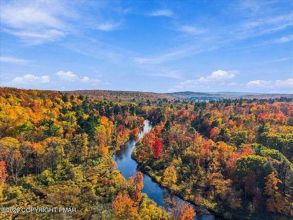 3.54 Acres of Land with Home for Sale in Pocono Lake, Pennsylvania