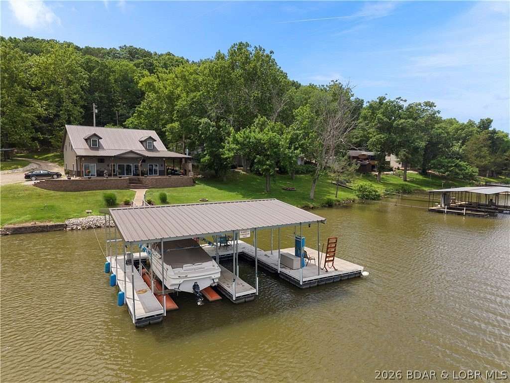 1.57 Acres of Land with Home for Sale in Camdenton, Missouri