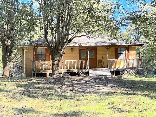 5.22 Acres of Land with Home for Sale in Oldfort, Tennessee