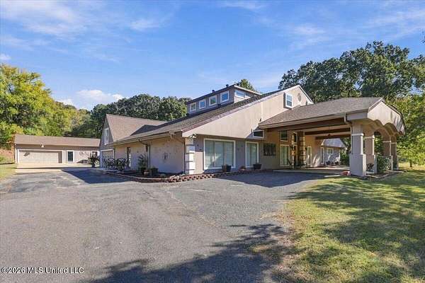 5 Acres of Land with Home for Sale in Southaven, Mississippi