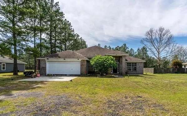 3.52 Acres of Land with Home for Auction in Bryceville, Florida