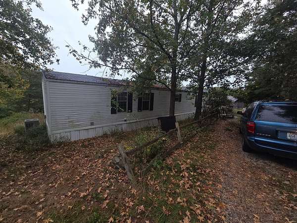 6 Acres of Land with Home for Sale in Irvine, Kentucky