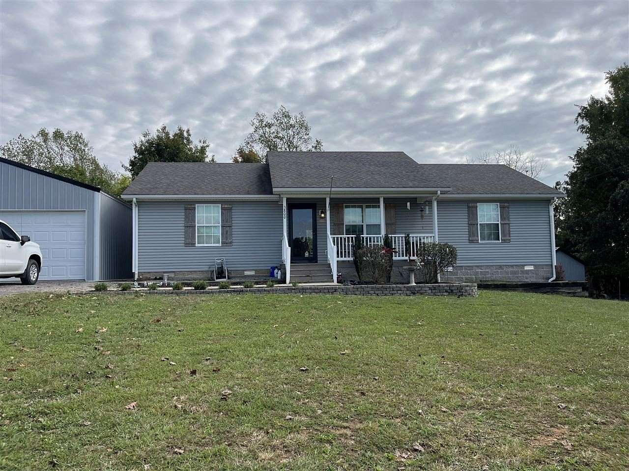 2.45 Acres of Land with Home for Sale in Scottsville, Kentucky