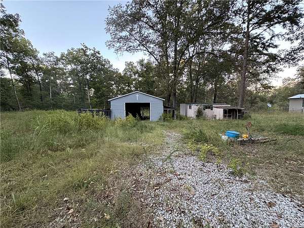 8.23 Acres of Land with Home for Sale in Flippin, Arkansas