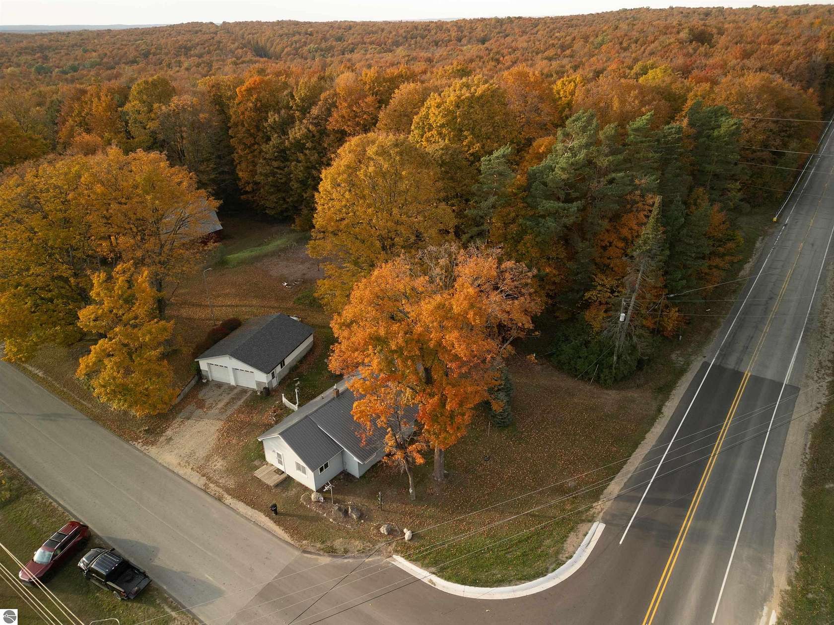 7.5 Acres of Land with Home for Sale in Mancelona, Michigan