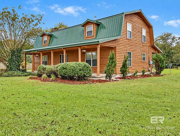 1.74 Acres of Land with Home for Sale in Irvington, Alabama
