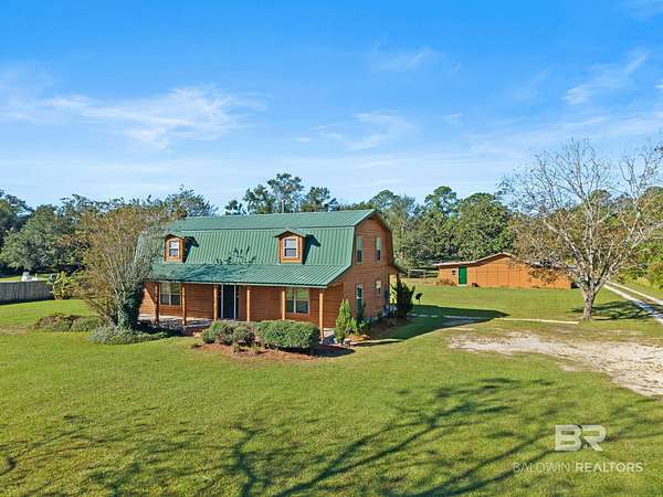 1.74 Acres of Land with Home for Sale in Irvington, Alabama