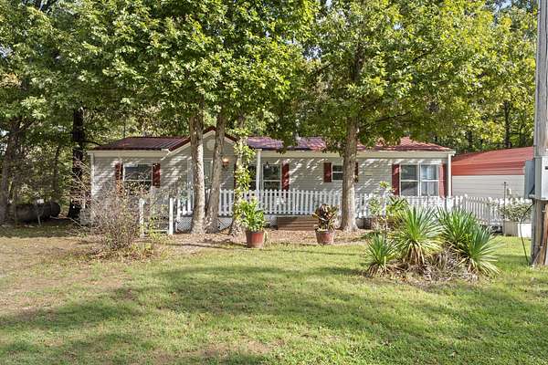1.57 Acres of Land with Home for Sale in Eucha, Oklahoma