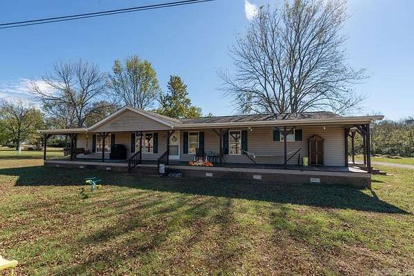 6.7 Acres of Land with Home for Sale in Wilburn, Arkansas