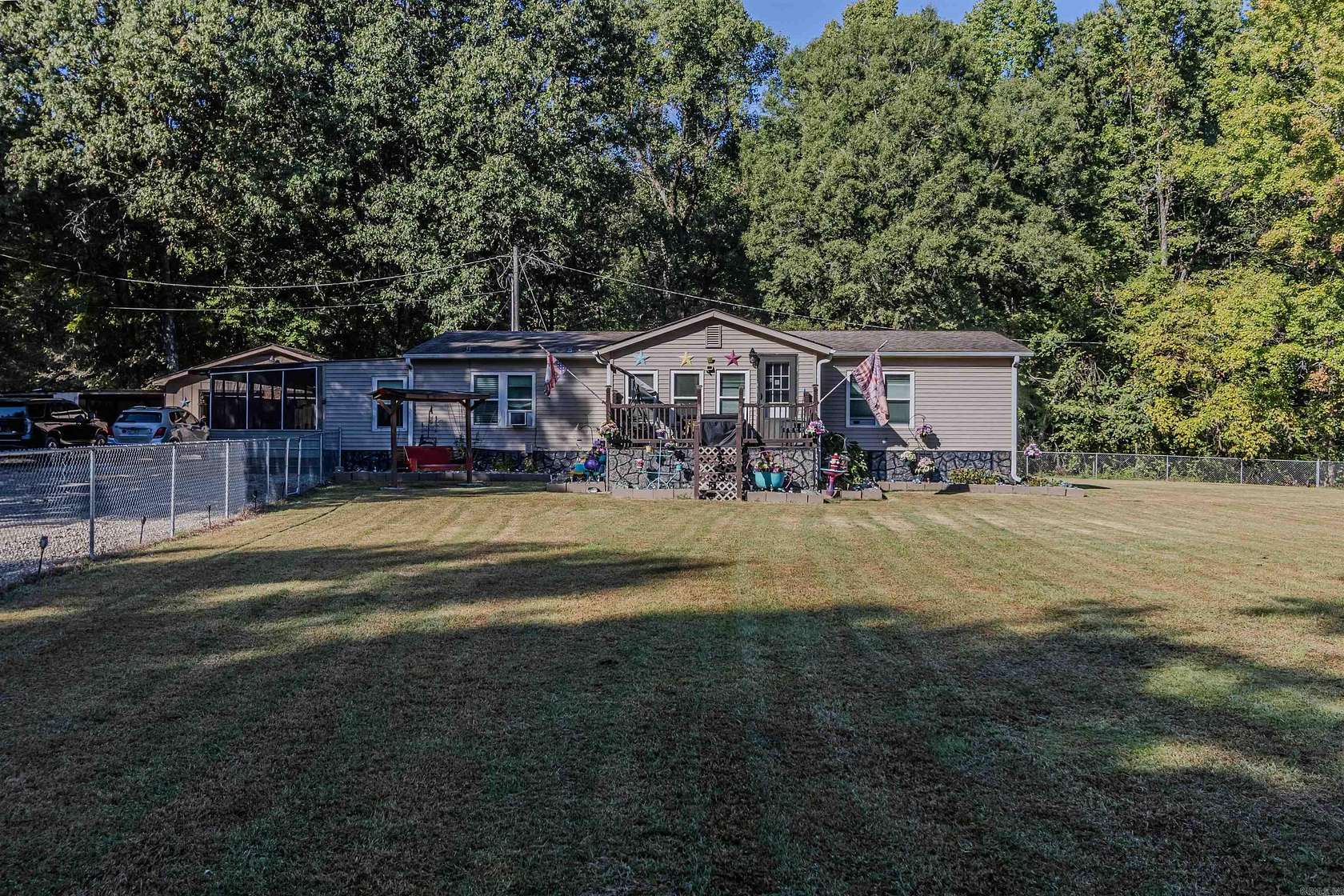 9.8 Acres of Land with Home for Sale in Lafe, Arkansas