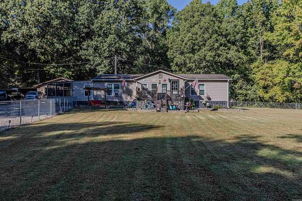 9.8 Acres of Land with Home for Sale in Lafe, Arkansas