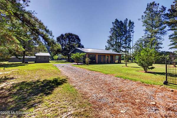 12.2 Acres of Land with Home for Sale in Lumberton, Mississippi