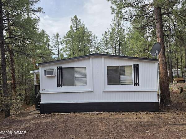 21.7 Acres of Land with Home for Lease in Show Low, Arizona