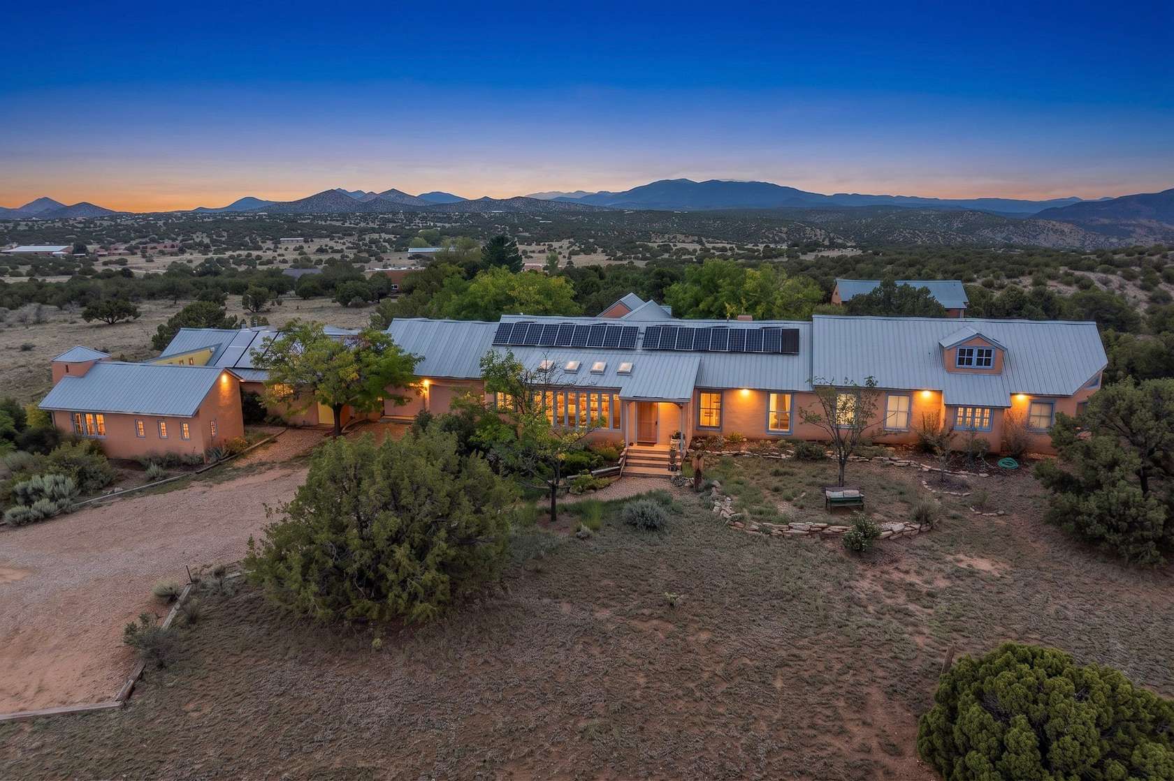 3.45 Acres of Land with Home for Sale in Lamy, New Mexico