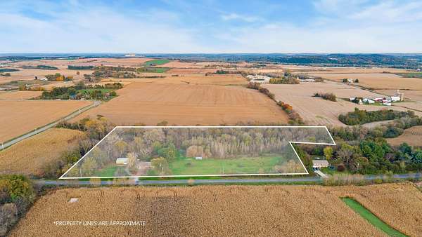 9.7 Acres of Land with Home for Sale in Portage, Wisconsin