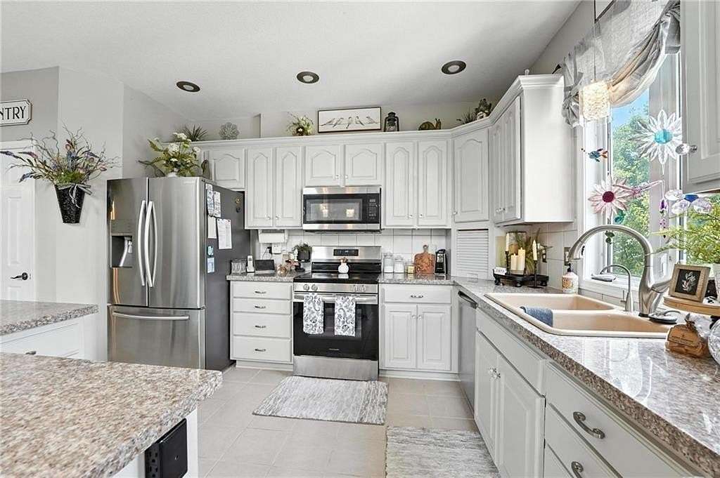 10 Acres of Land with Home for Sale in Buckner, Missouri