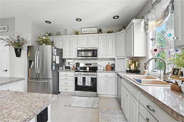 10 Acres of Land with Home for Sale in Buckner, Missouri