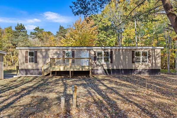 1.79 Acres of Land with Home for Sale in Cedar Springs, Michigan