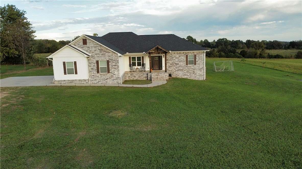 10 Acres of Land with Home for Sale in Clarksville, Arkansas