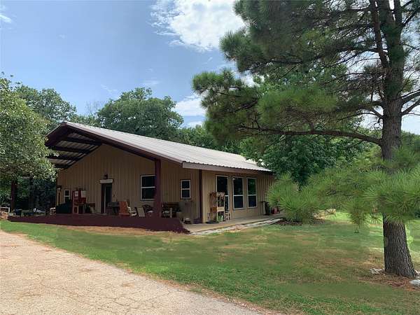 11.6 Acres of Land with Home for Lease in Cross Roads, Texas