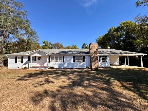 4.69 Acres of Land with Home for Sale in Sawyerville, Alabama