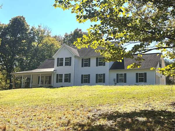 8 Acres of Land with Home for Sale in Cleveland, Tennessee