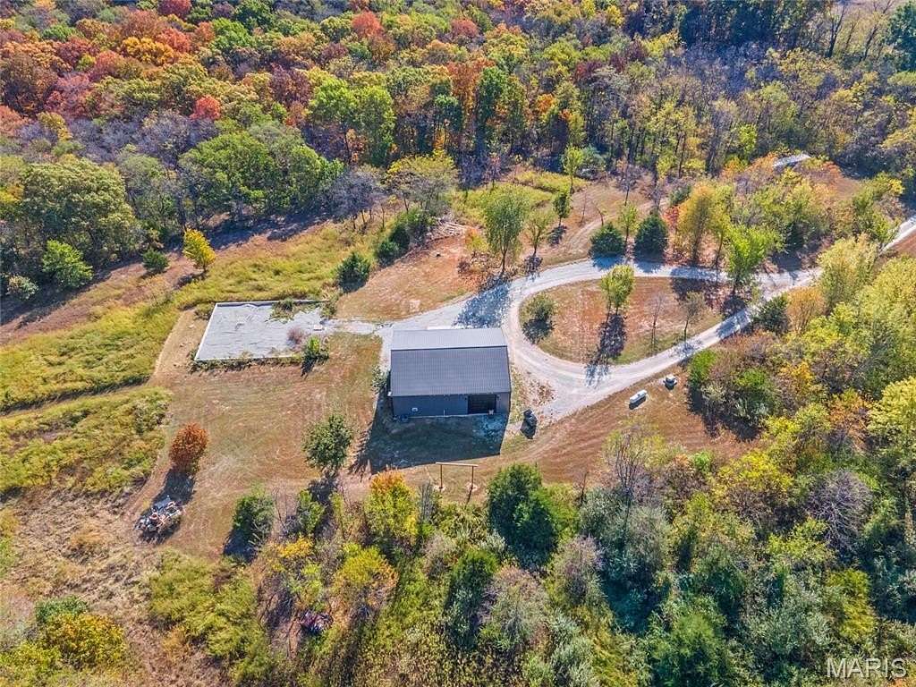 44.8 Acres of Recreational Land with Home for Sale in Eolia, Missouri