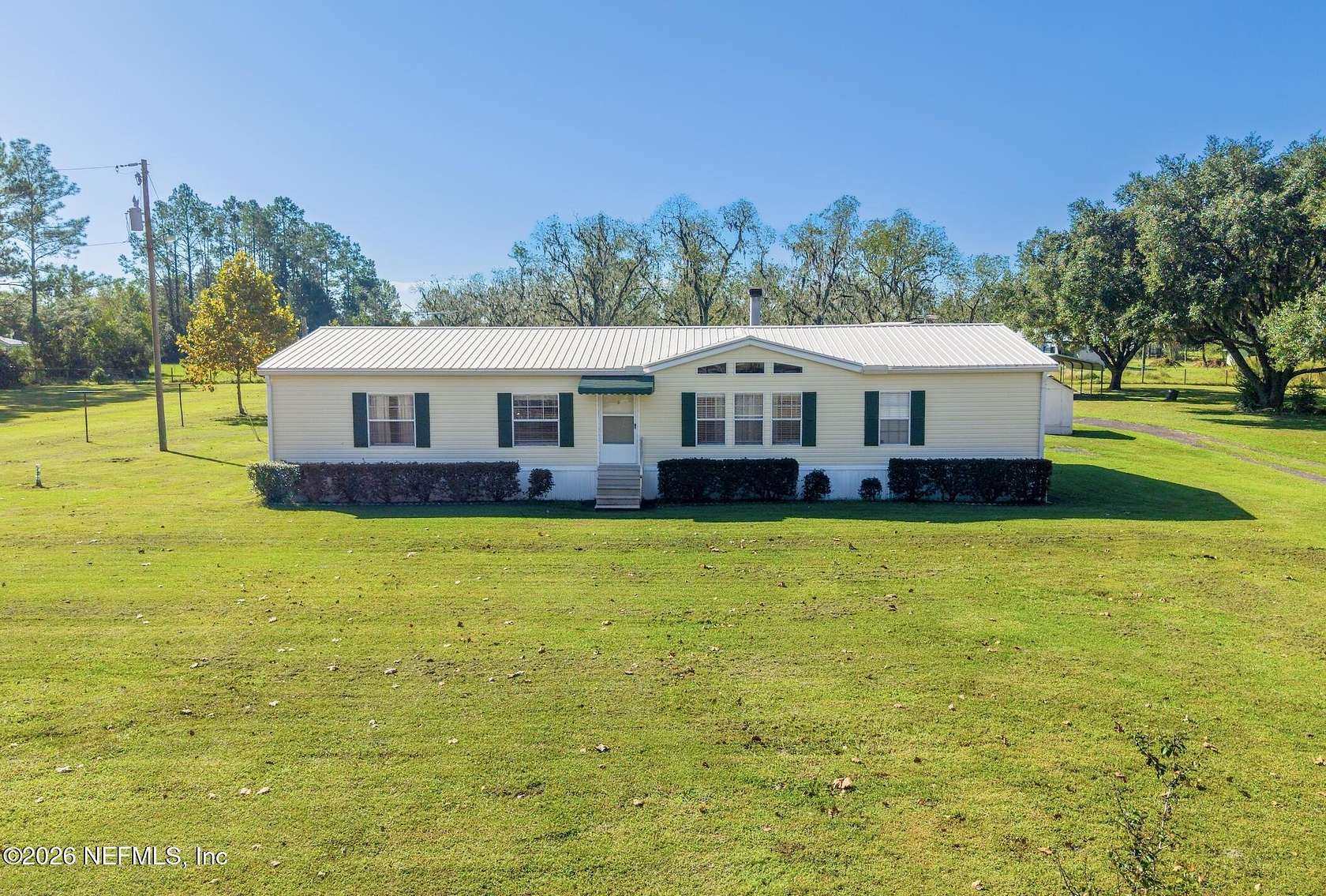 5.66 Acres of Land with Home for Sale in Lawtey, Florida