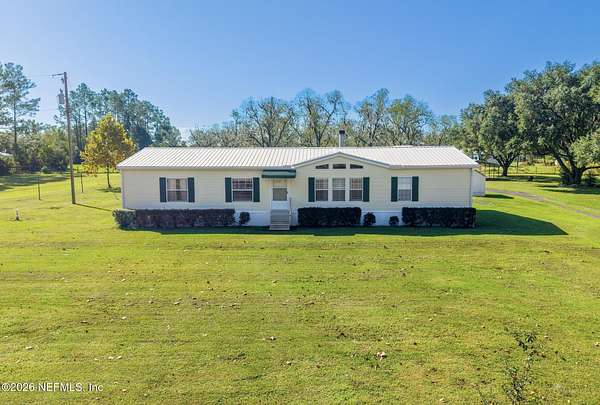5.66 Acres of Land with Home for Sale in Lawtey, Florida