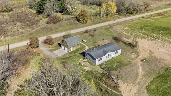 5 Acres of Land with Home for Sale in Mora, Minnesota