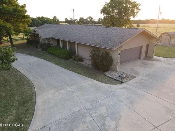 26 Acres of Land with Home for Sale in Parsons, Kansas