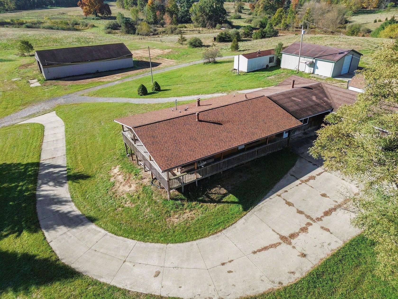 5 Acres of Land with Home for Sale in Grass Lake, Michigan