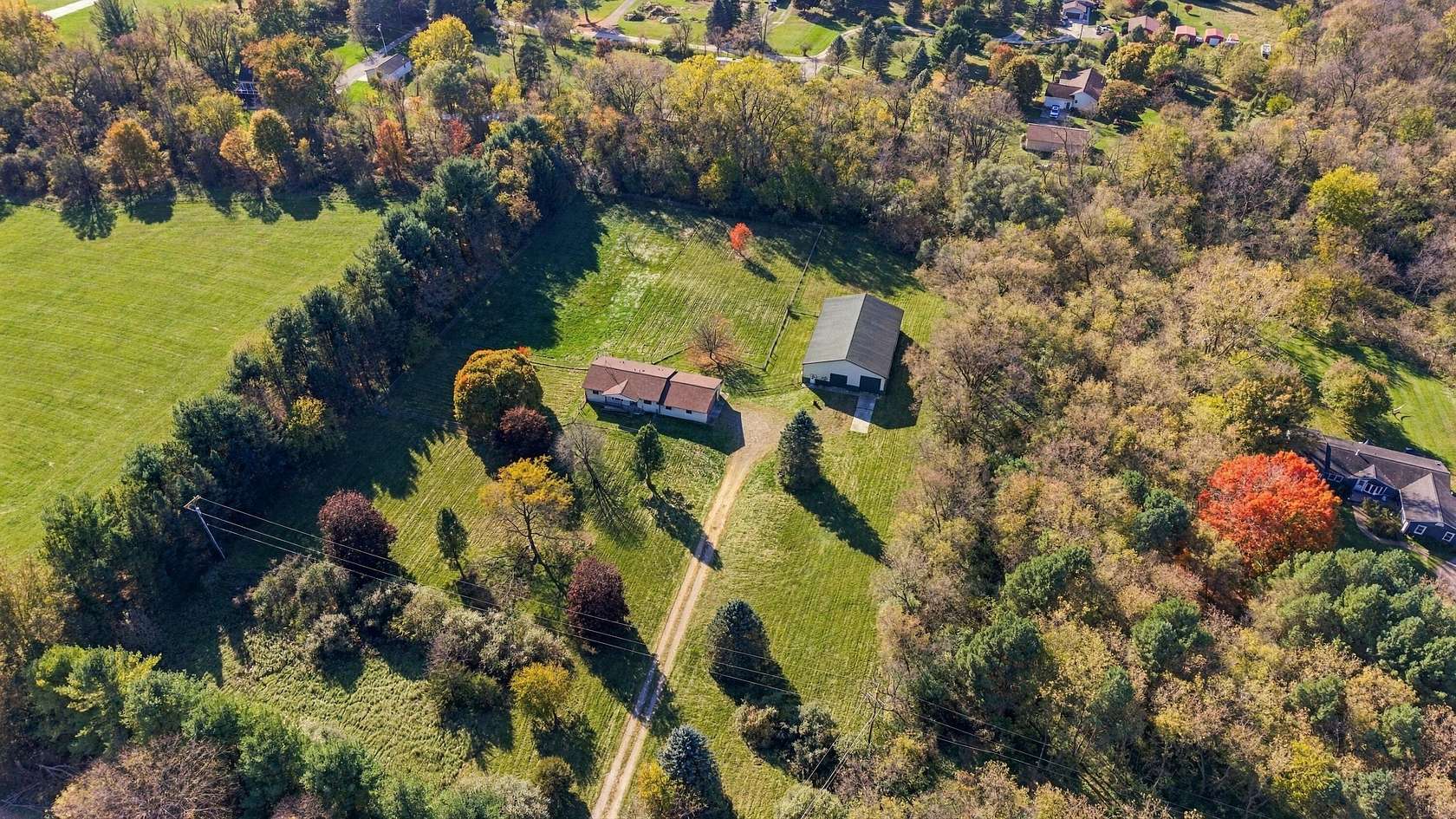 5 Acres of Land with Home for Sale in Whitmore Lake, Michigan