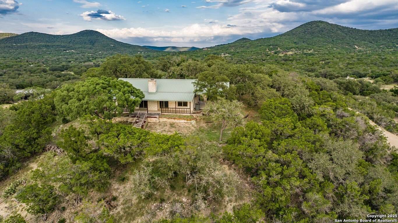 24.8 Acres of Recreational Land with Home for Sale in Utopia, Texas