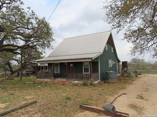 16.9 Acres of Land with Home for Sale in Poteet, Texas