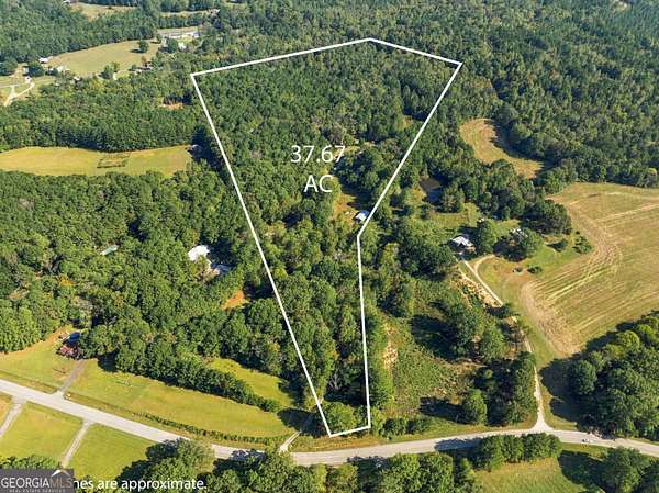 37.7 Acres of Land with Home for Sale in Summerville, Georgia