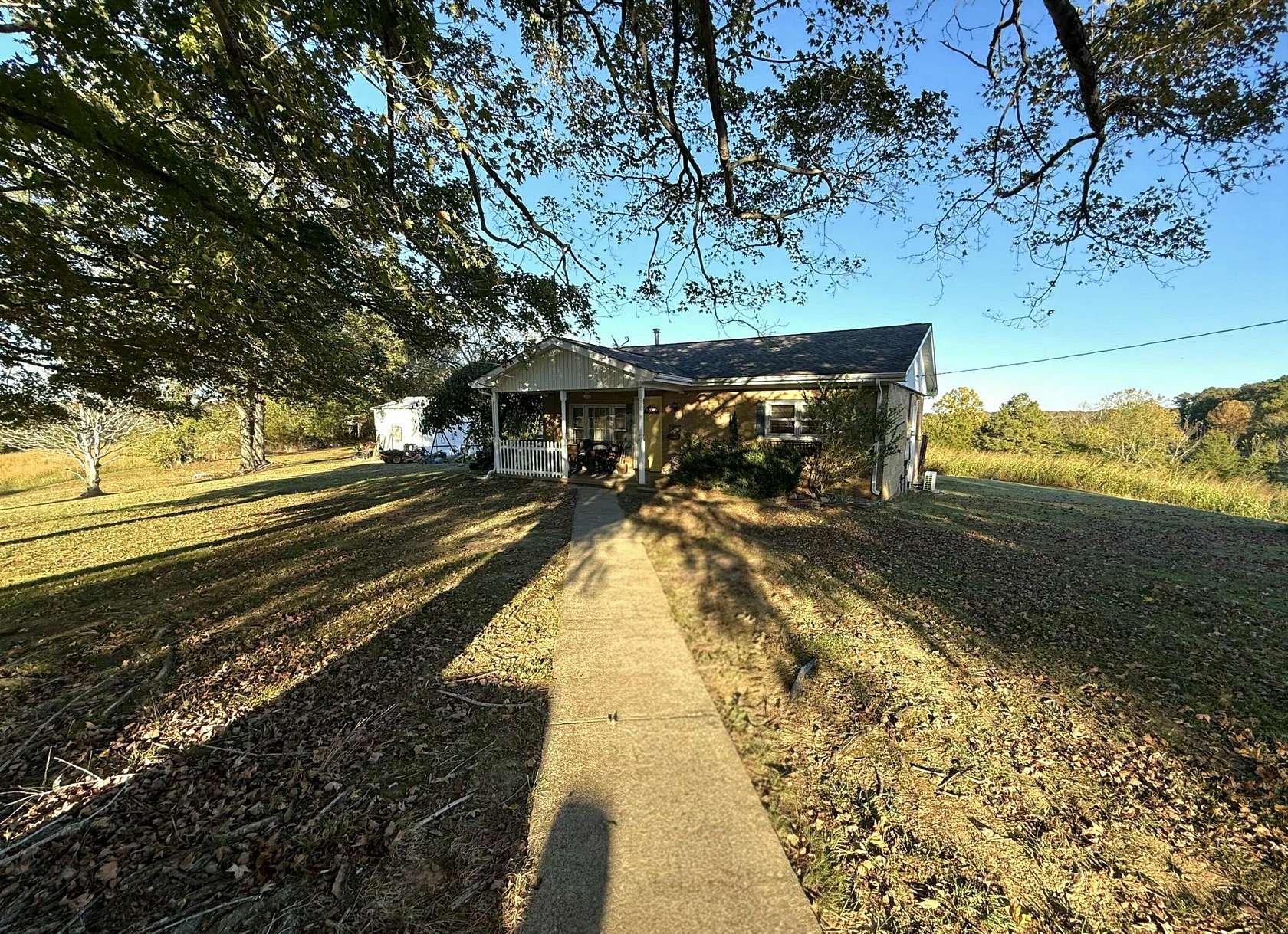 10 Acres of Land with Home for Sale in Dexter, Kentucky