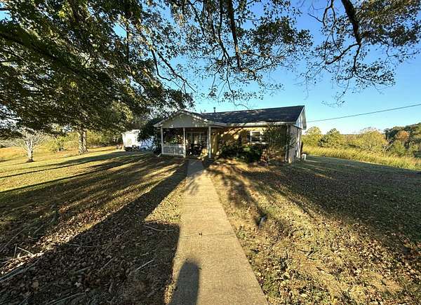 10 Acres of Land with Home for Sale in Dexter, Kentucky