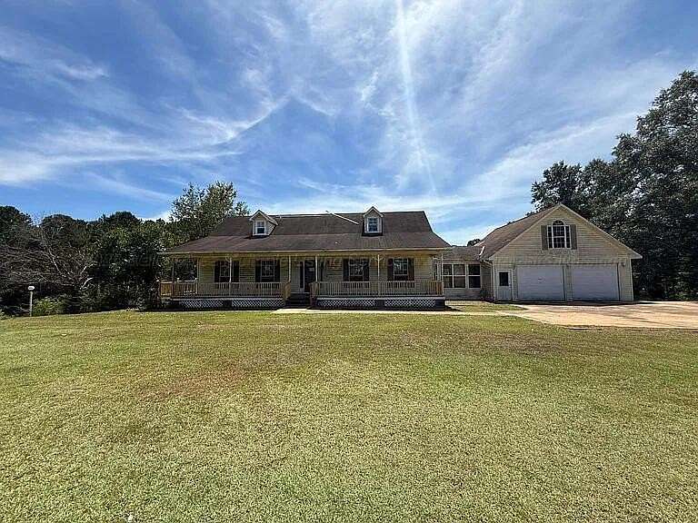 7 Acres of Land with Home for Sale in Winfield, Alabama