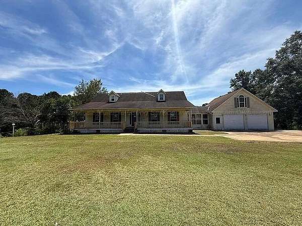 7 Acres of Land with Home for Sale in Winfield, Alabama