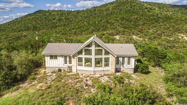 100 Acres of Recreational Land with Home for Sale in Utopia, Texas