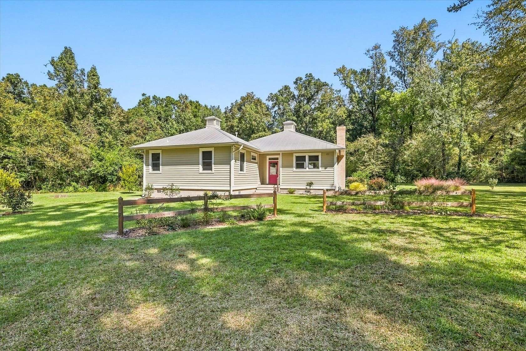 6.87 Acres of Land with Home for Sale in Crawfordville, Florida