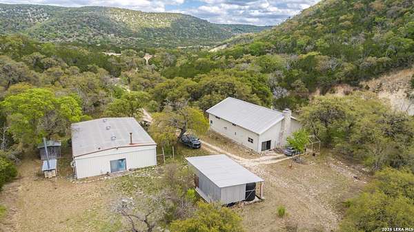 230 Acres of Recreational Land with Home for Sale in Utopia, Texas